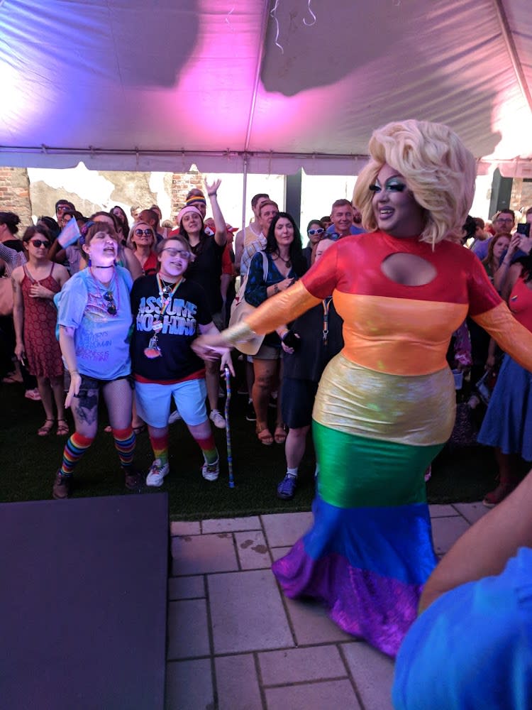 Drag Queen Sarah Jessica Darker dancing in front of NKY Pride crowd at Hotel Covington