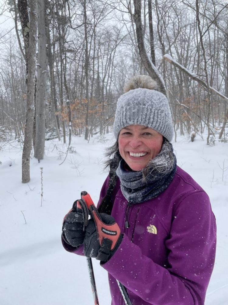 Cross-country skiing and snowmobiling are popular ways of getting around car-free Mackinac Island in the winter.