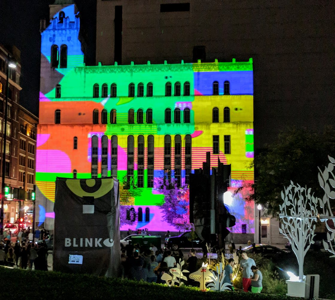 A Catholic church in downtown Cincinnati, illuminated in rainbow lights for BLINK.