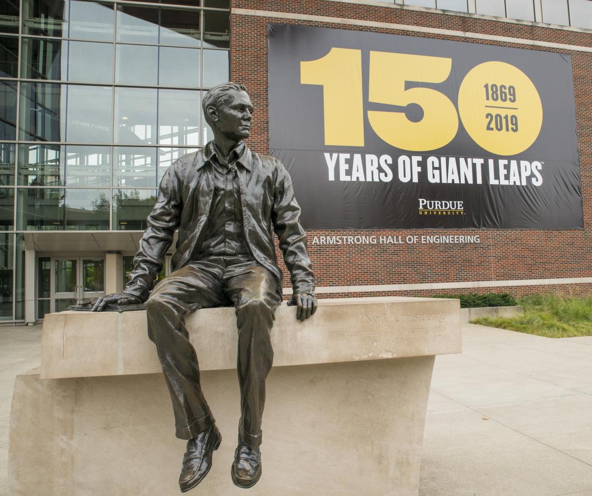 Neil Armstrong in front of Armstrong Hall of Engineering