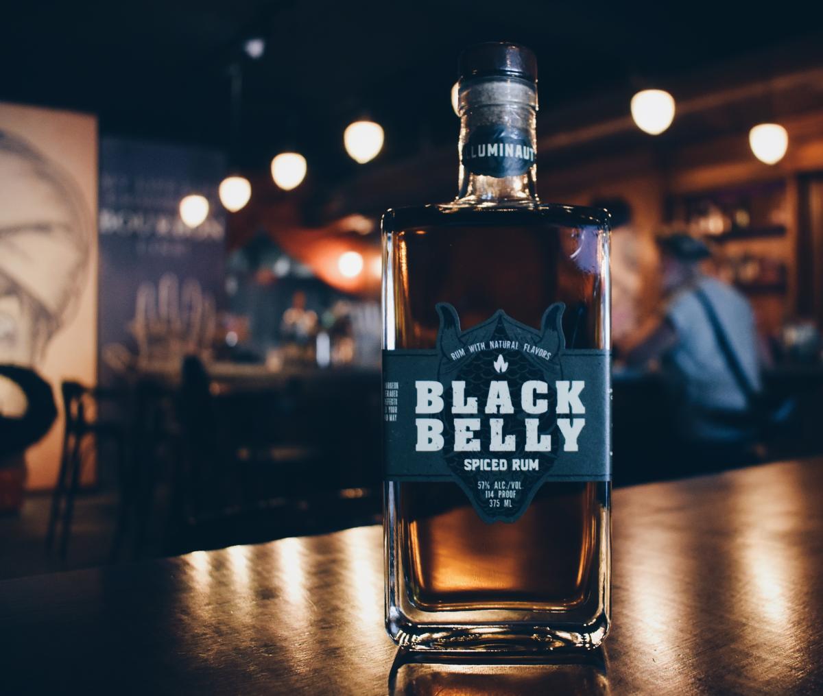 A bottle of Black Belly spiced rum sits on the bar at Second Sight Spirits.