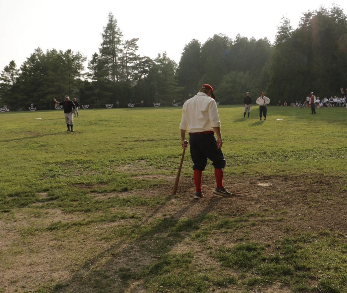 A member of the Mackinaw City Boys prepares to bat in a vintage base ball game on Mackinac Island