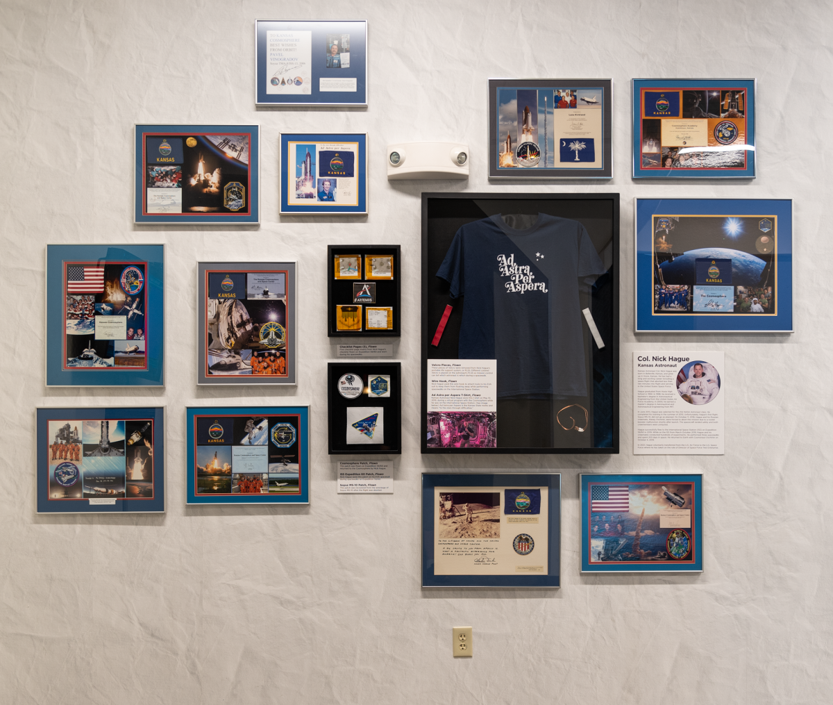 Items flown in space are displayed as part of the "Flags and More: Items Flown in Space" exhibit at Kansas Cosmosphere