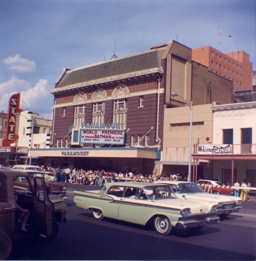 Historic image of the Paramount Theater, with a marquee sign showing the premier of "Batman"