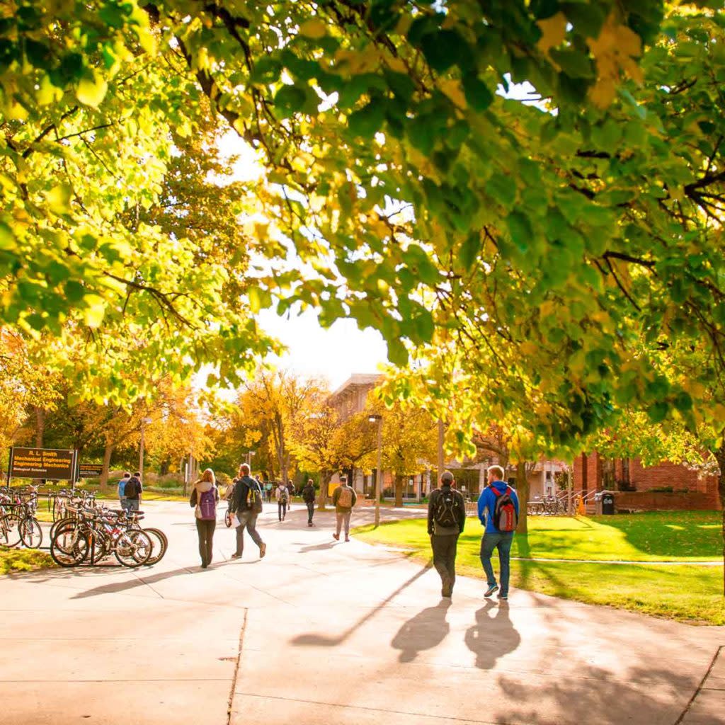 Students walk across Michigan Tech's campus.