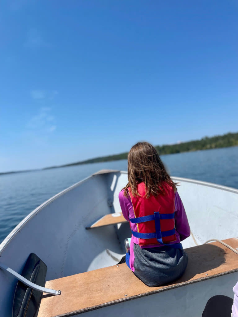Young girl in boat on Isle Royale