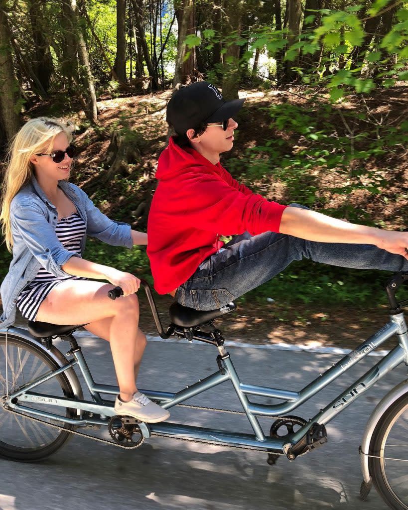 Couple Riding on Rented Tandem Bike on Mackinac Island