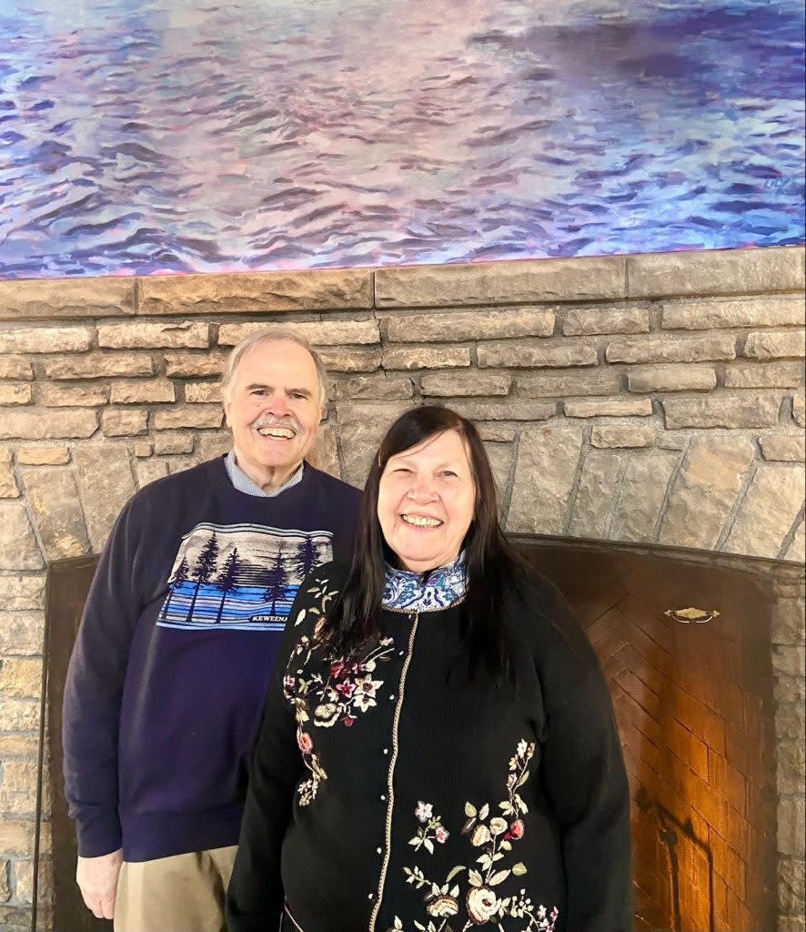 A photo of an Ohio couple who were the first guests of the 2022 season at Mackinac Island’s Mission Point Resort.