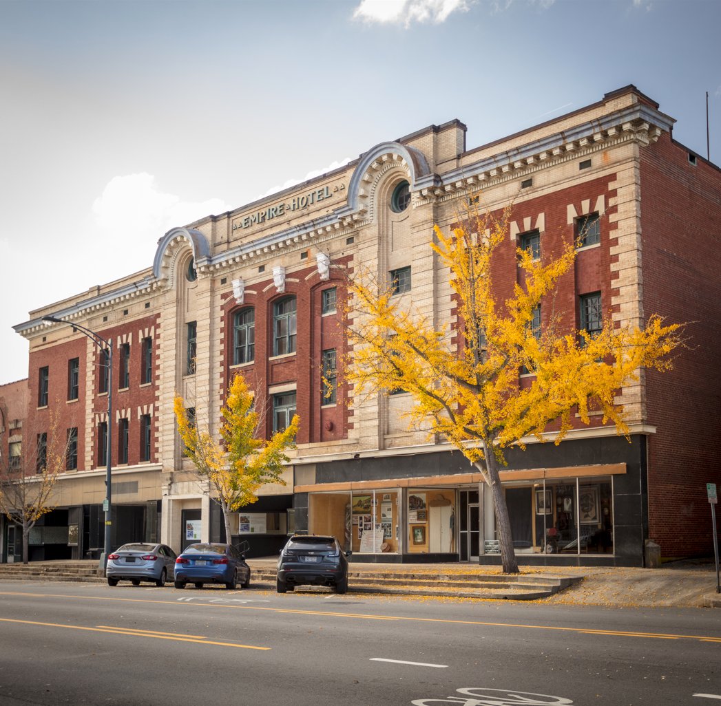 Fall trees in front of historic downtown building
