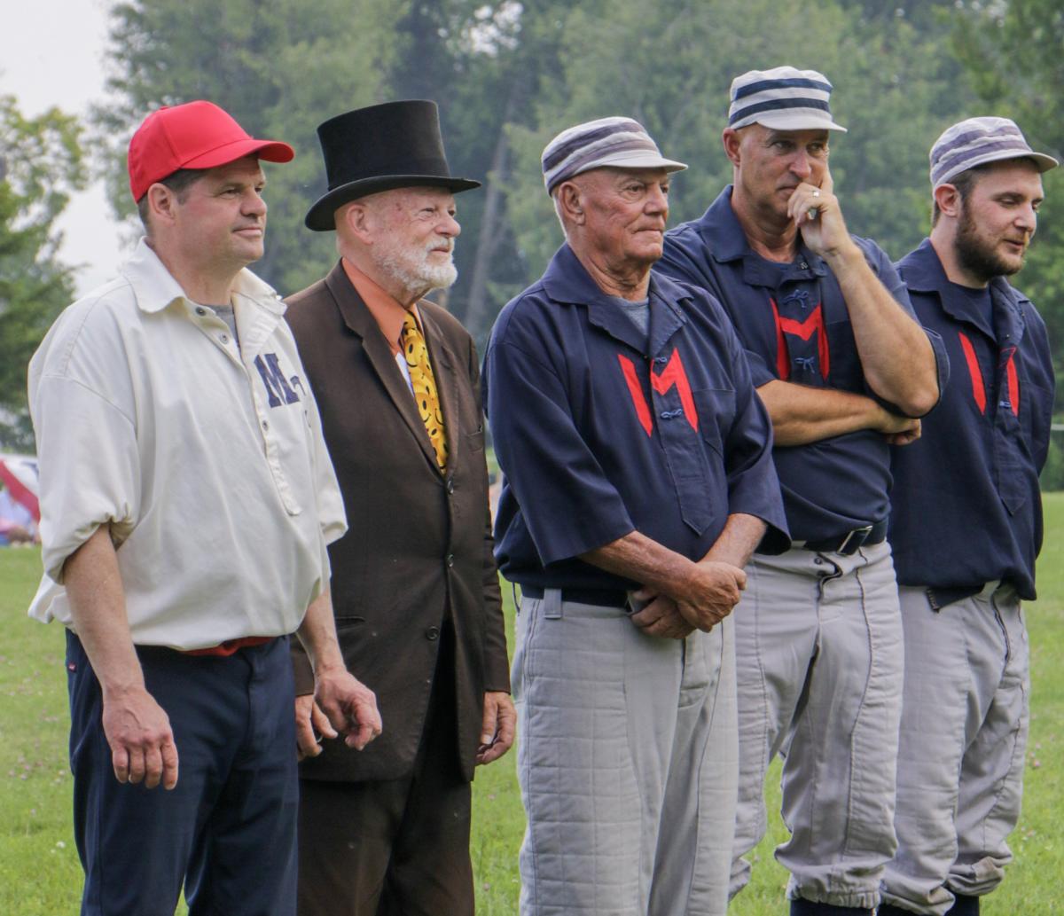 Former Detroit Tigers pitcher John Hiller stands with other participants in a vintage base ball game on Mackinac Island