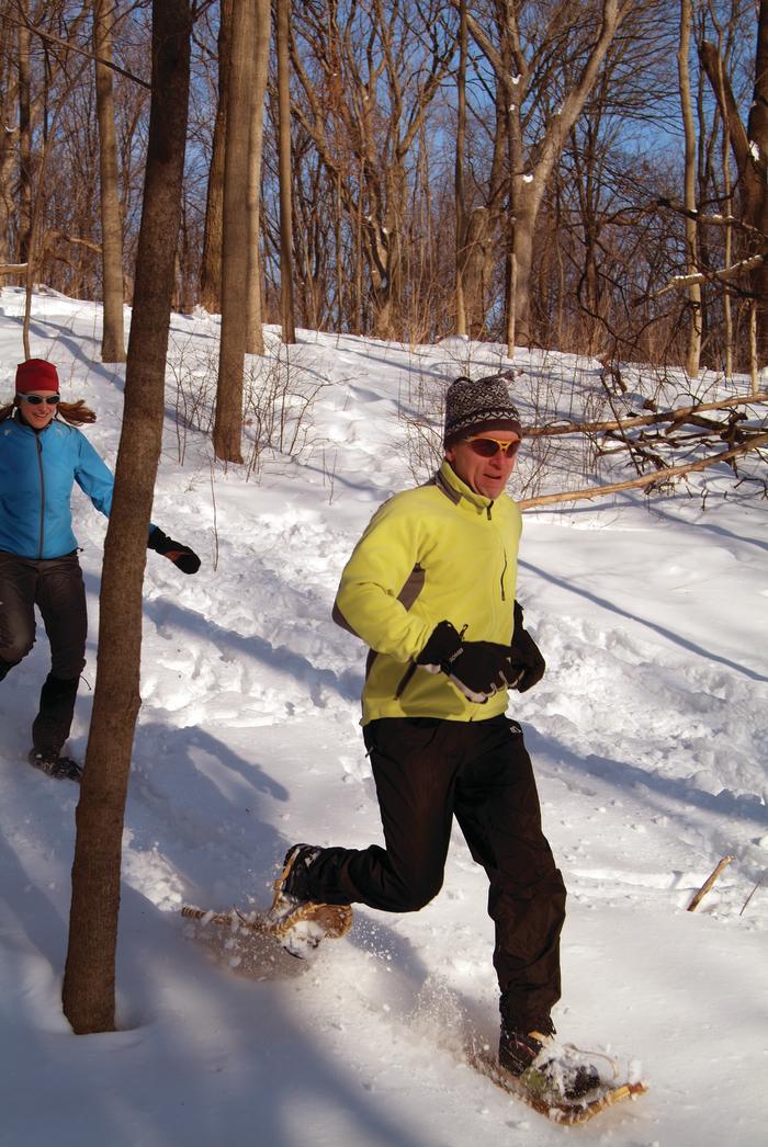 two people snowshoeing