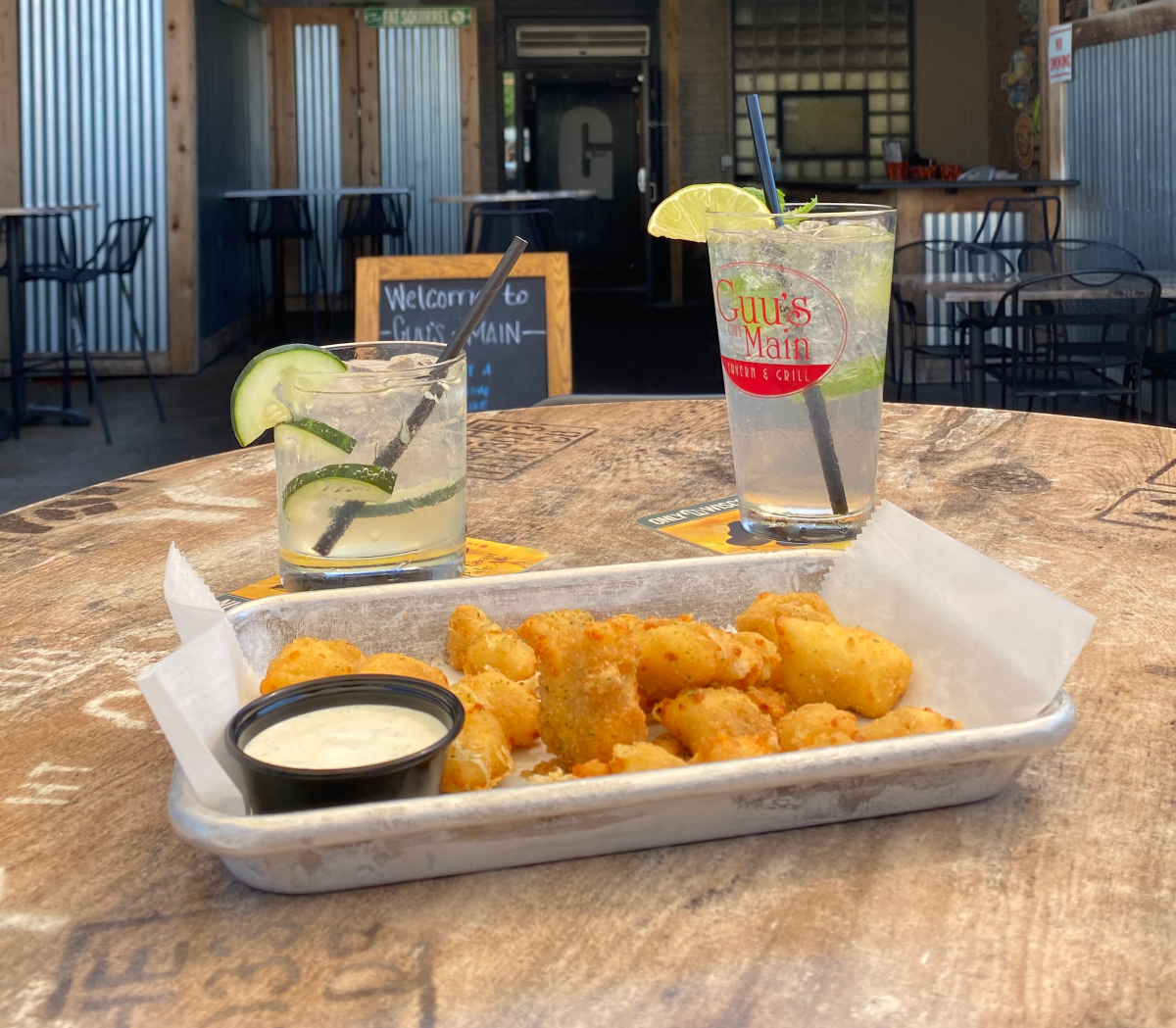 Try the yummy cheese curds at Guu's On Main with a cocktail to wash it down.