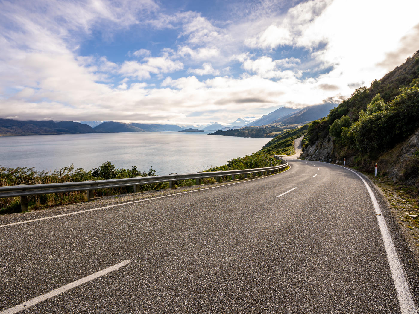 Iconic Queenstown Glenorchy Road with lake and mountain views