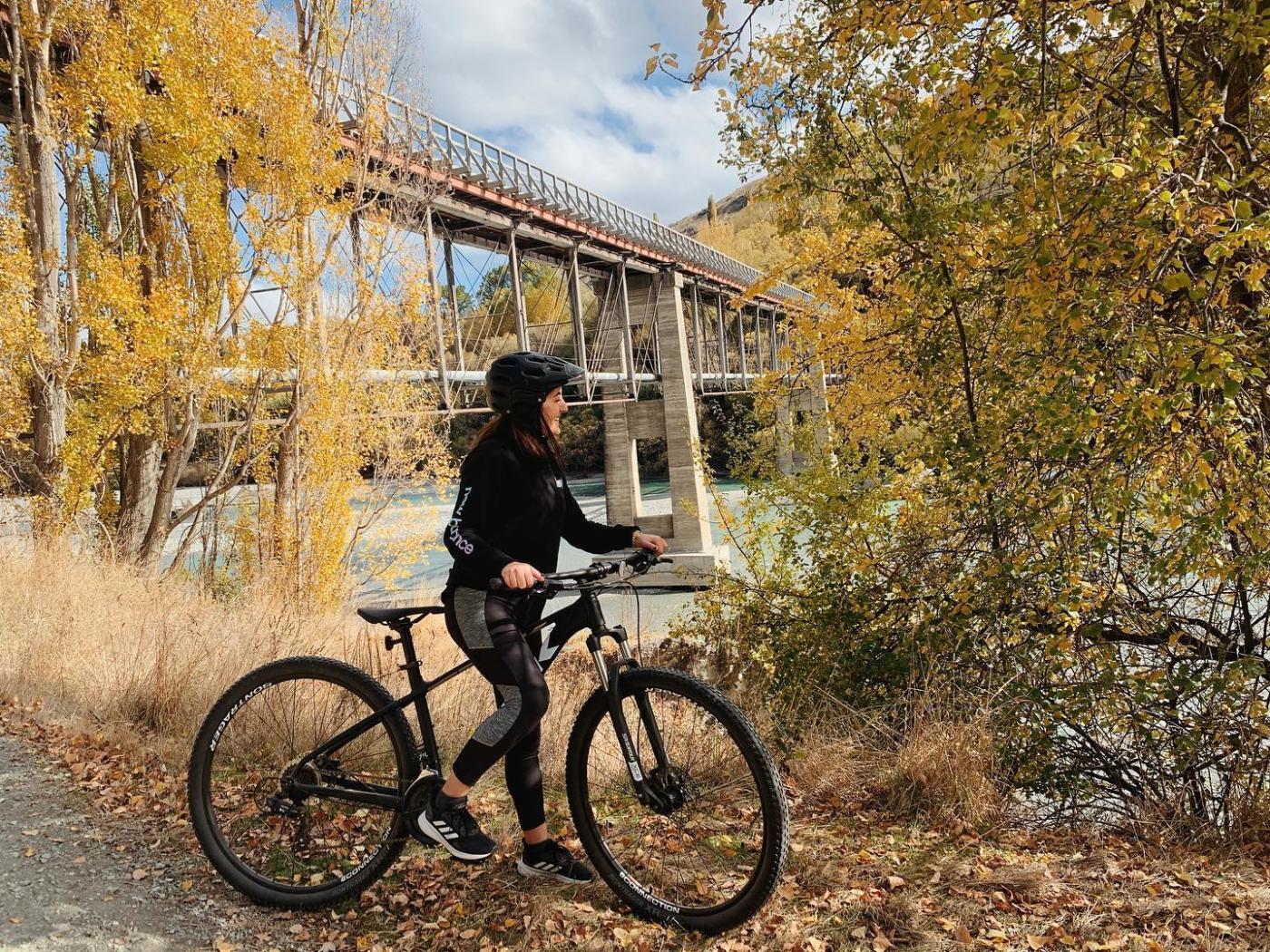 Biking the Twin Rivers Trail in Autumn, beside the Lower Shotover Bridge