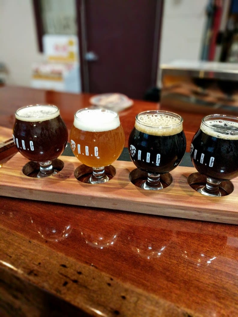 A flight of craft beer from Alexandria Brewing Company