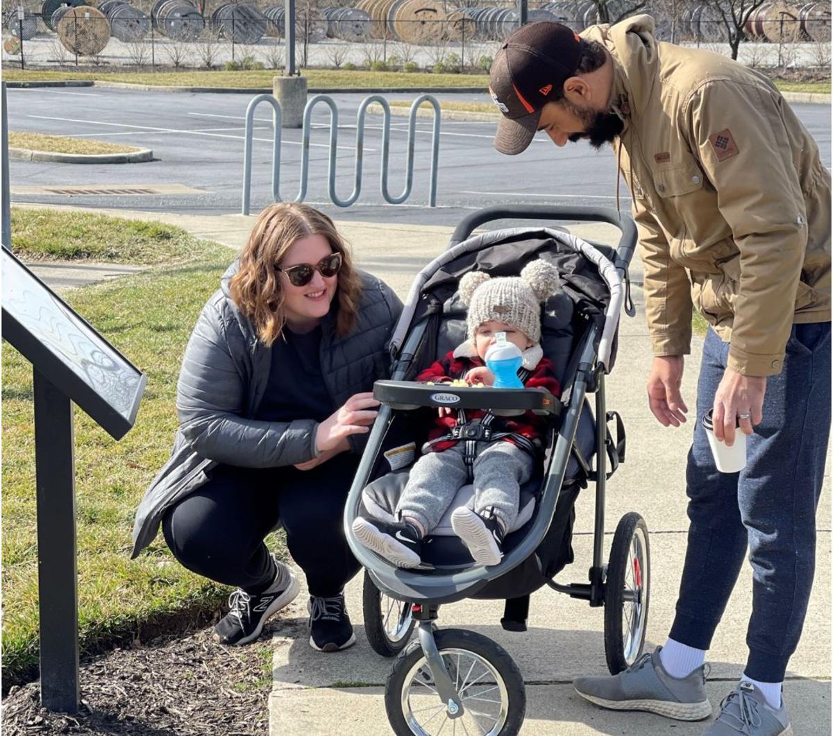 A family enjoys a Story Trail