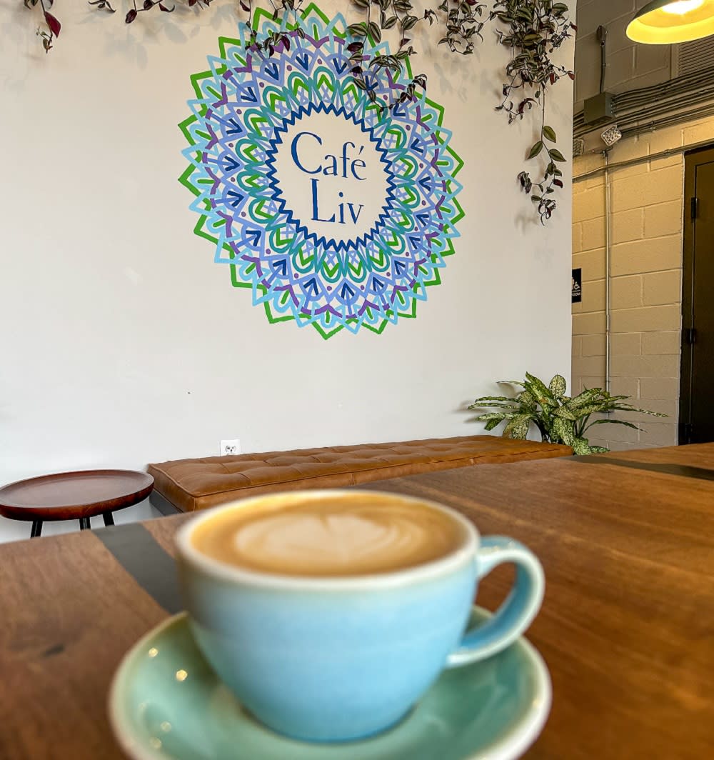 Inside cafe liv with latte