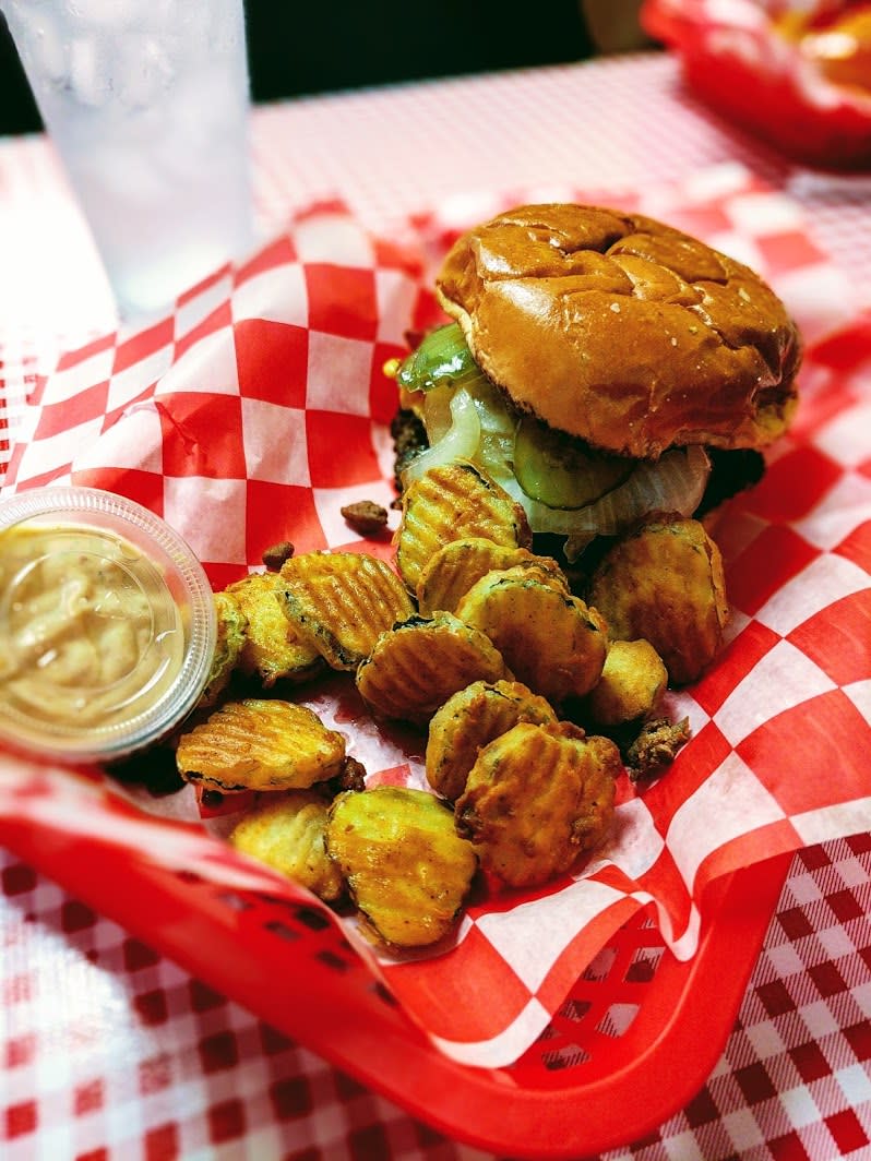 red basket of burger and pickle chips from bard's burgers in covington kentucky