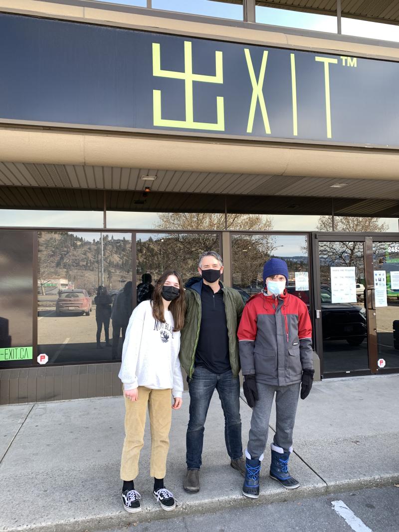 Exit Kelowna - Lisa's Family in front of the building