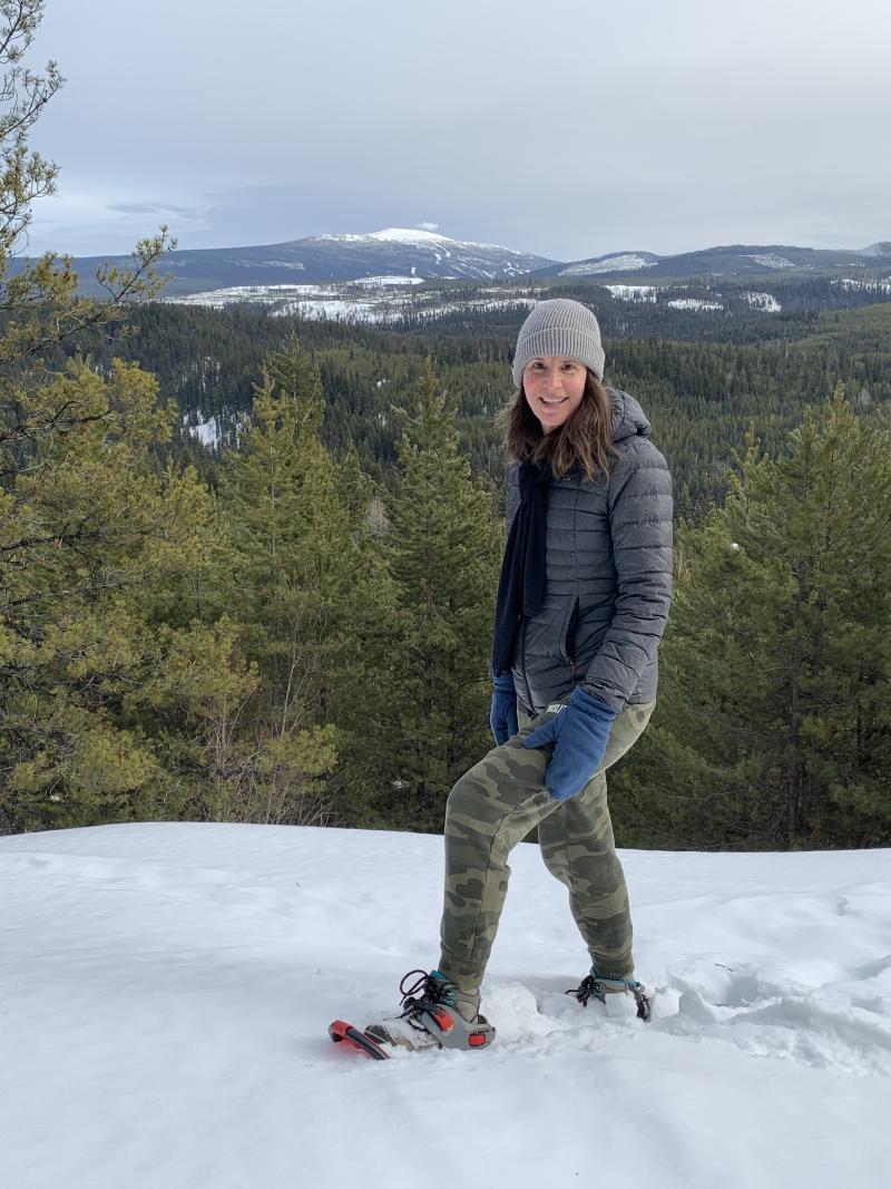 Lisa Kadane Snowshoeing with Big White Mountain in Background