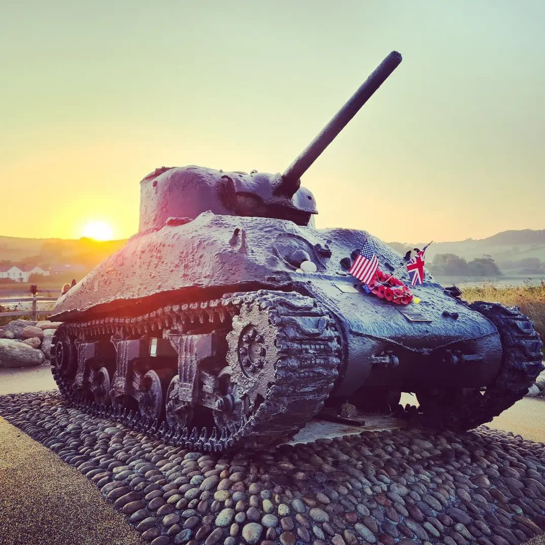 Sherman Tank at Slapton Sands with sunset in background