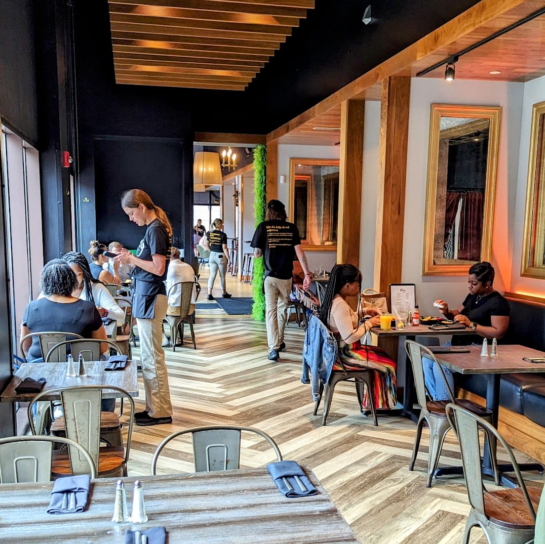 Image is of inside the right side dinning room featuring table and chairs.