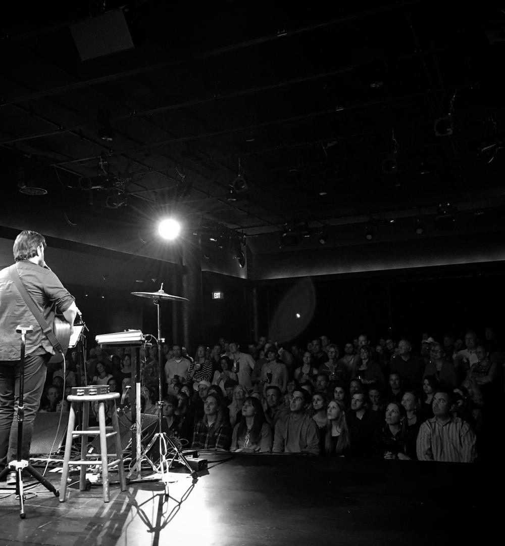 Bob Schneider looking out into the audience at 3TEN