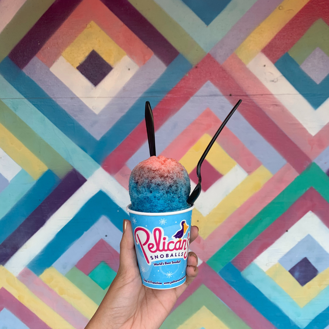 A red and blue snowcone from Pelican's SnoBalls