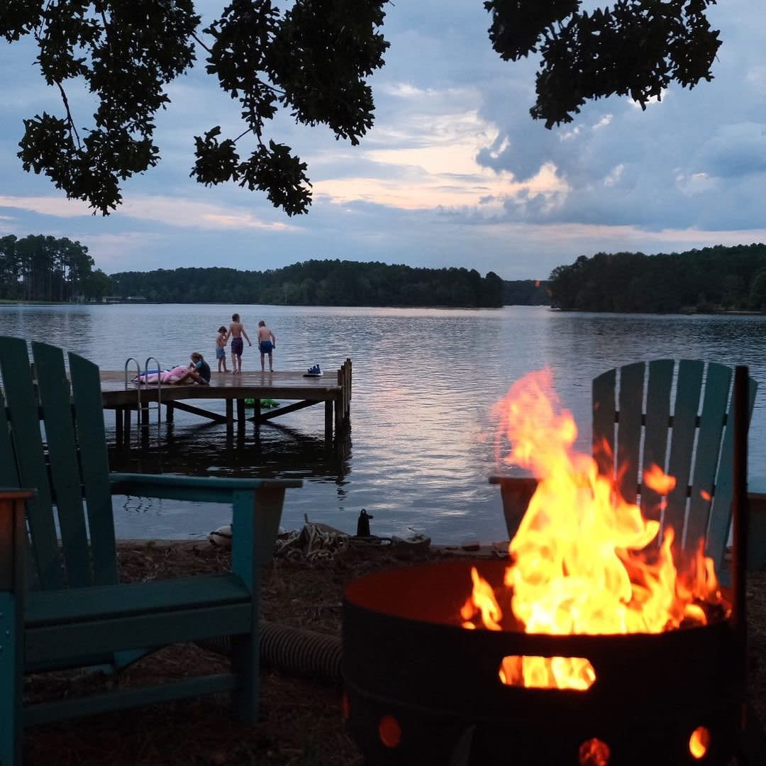 kids on dock and fire pit on lake sinclair vacation rental