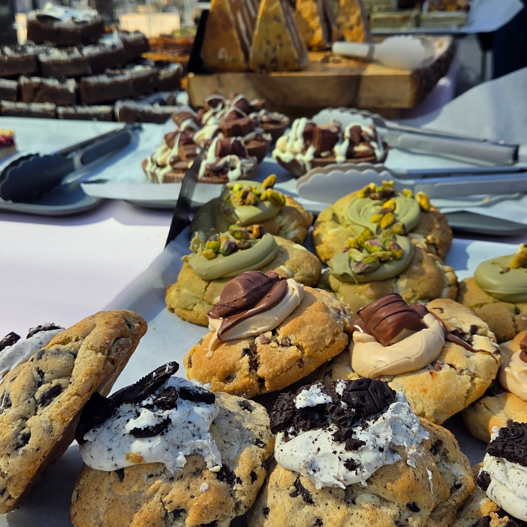 Homemade baked artisan cookie topped with oreos, kinder bueno and pistachio at the Carlton Place Market
