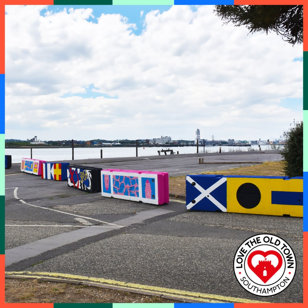 Colourful painted bollards in Mayflower Park