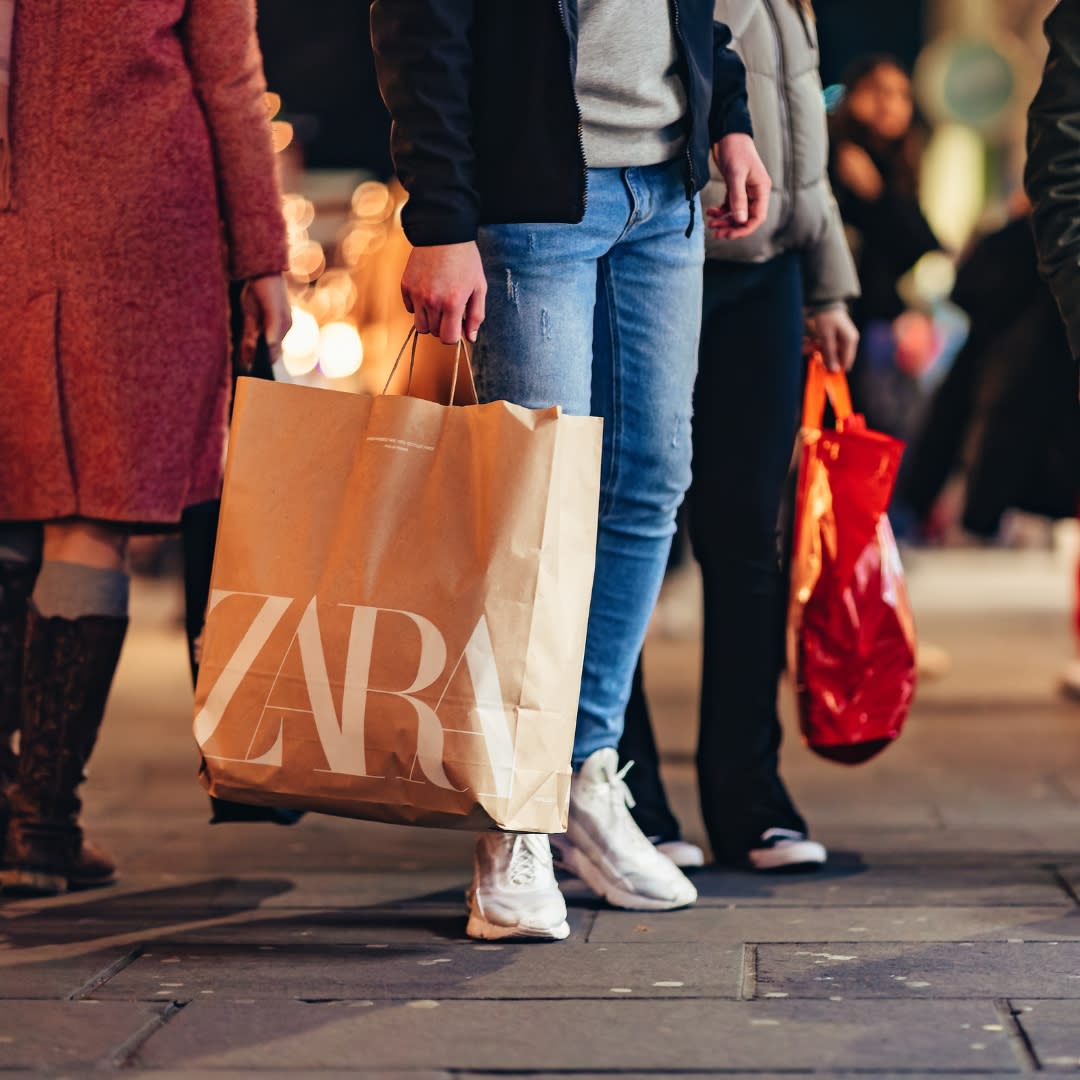 Shoppers on the high street late-night shopping