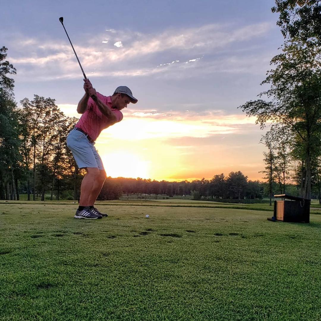 Teeing off at SentryWorld Golf Course in Stevens Point at sunset