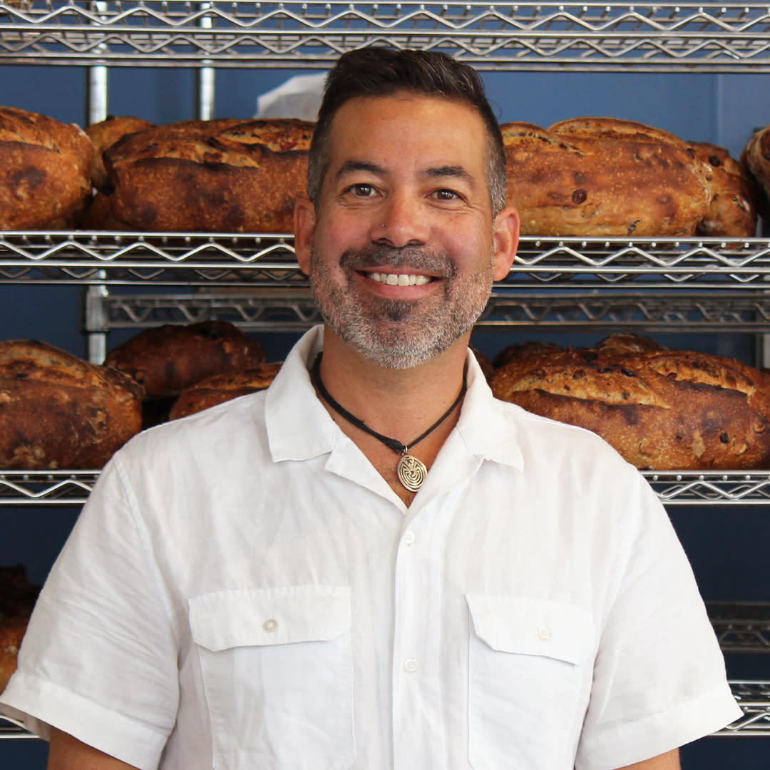Portrait of Don Guerra, owner of Barrio Bread