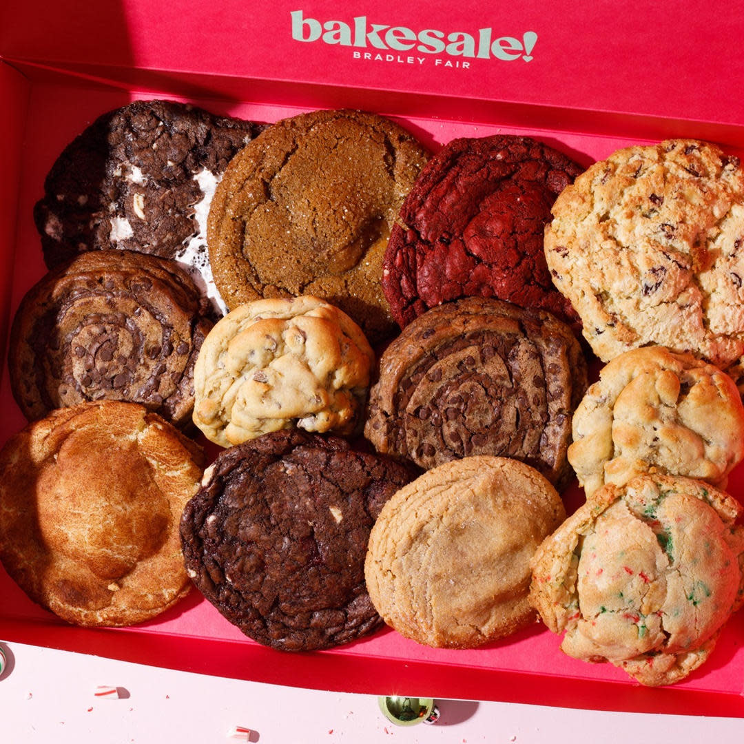 A variety of cookies are sold in a box at Bakesale Treat Parlor