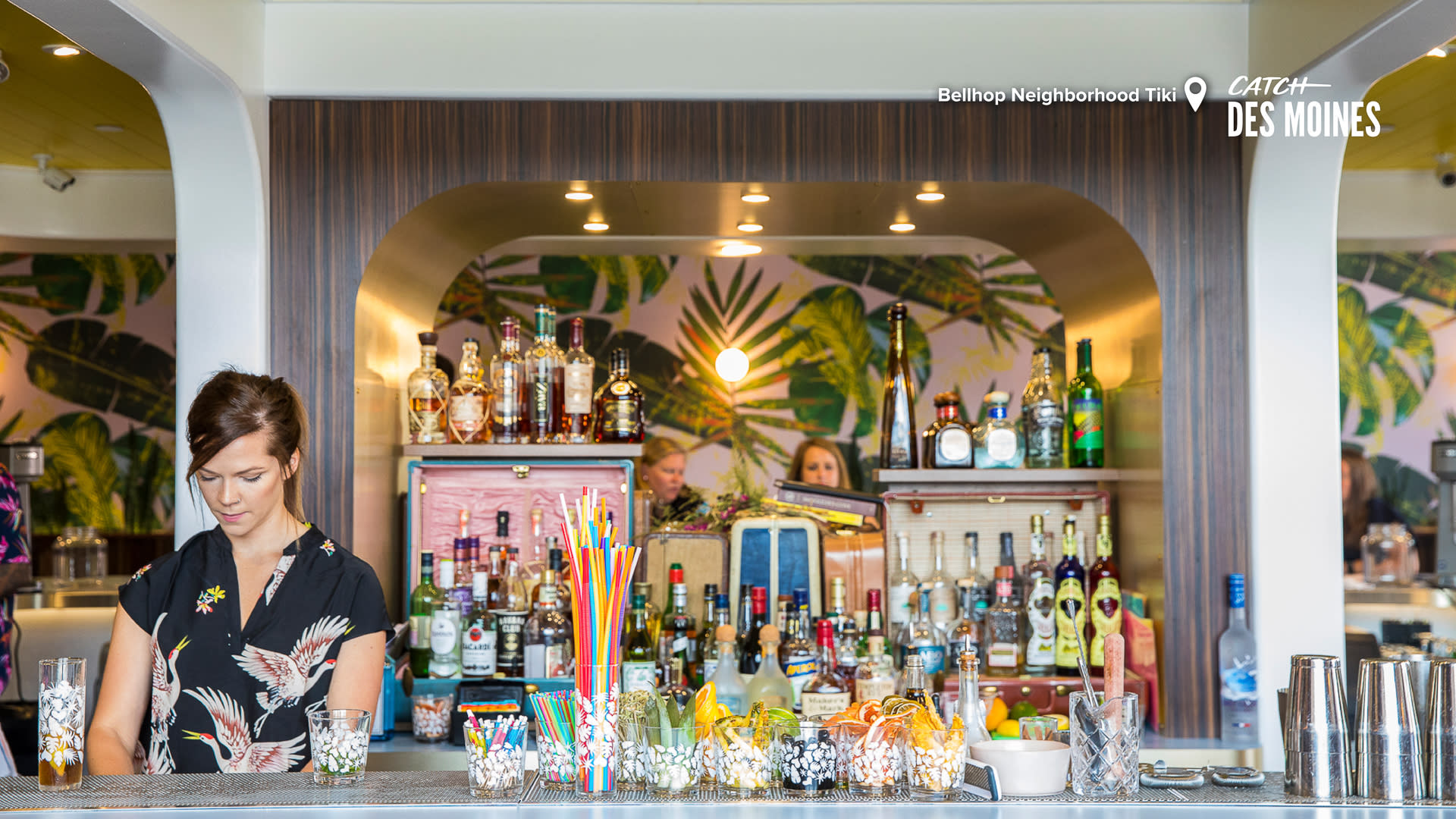 Bartender with Top Shelf Alcohol at Bellhop Tiki Zoom Background