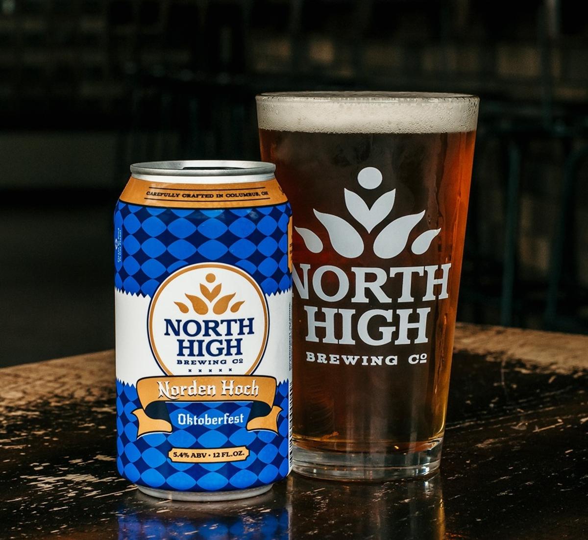 Can and pint glass of Oktoberfest beer from North High Brewing