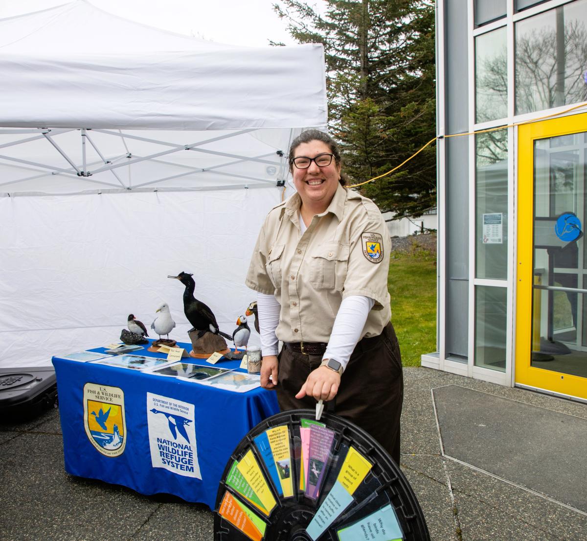 Park ranger with a spinning wheel of prizes