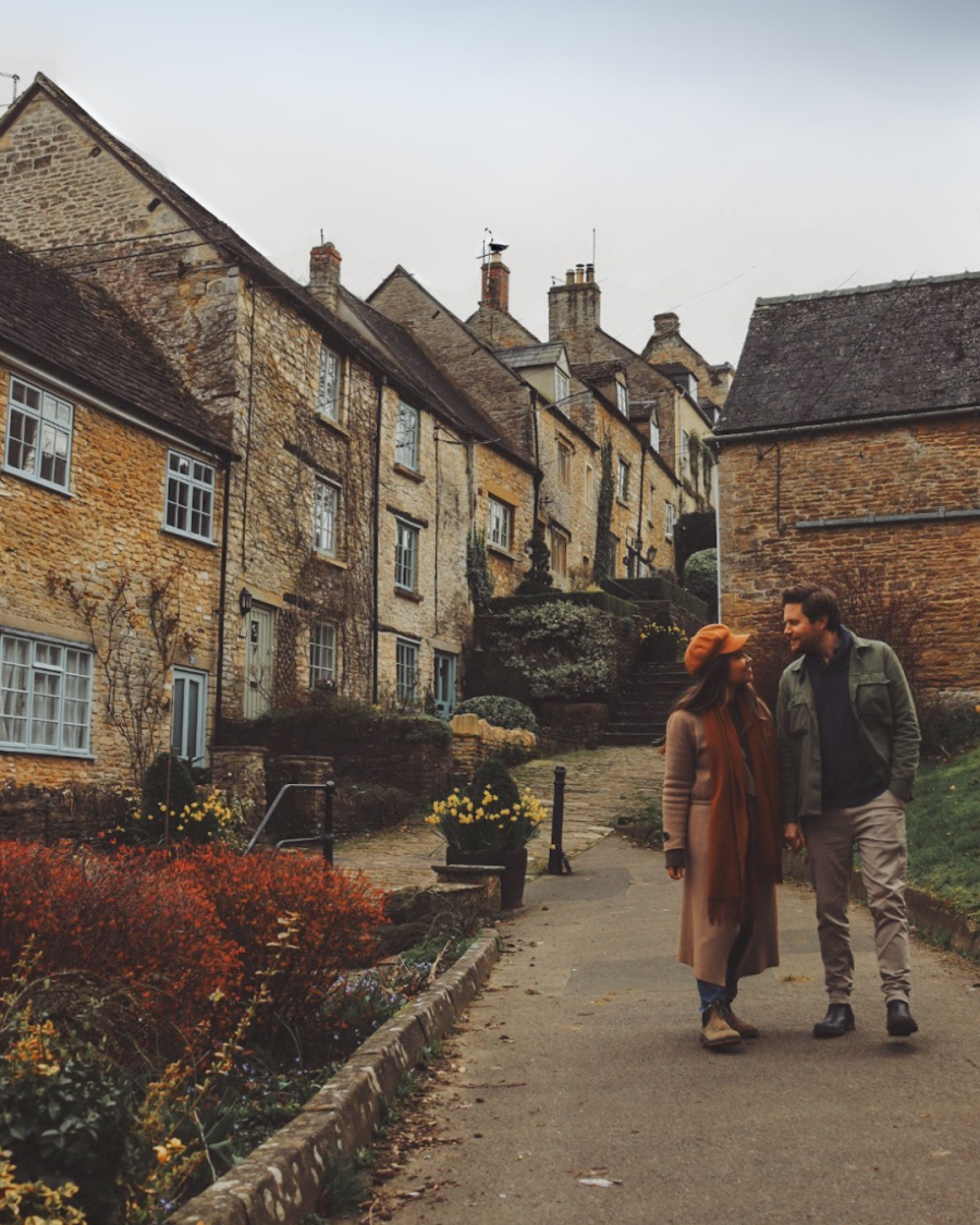 Steph & Tom, aka Bean & Bear, walk down the Chipping Steps in Tetbury