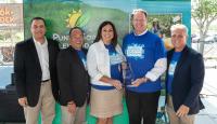 Laurie and Keith Farlow with Commissioner Chris Constance, John Lai with FRLA, and Sean Doherty, Director of Tourism