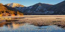 A view of frozen Grand Lake looking towards Mount Baldy