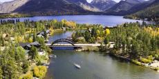 A fall aerial view of Grand Lake, the Channel and rainbow bridge