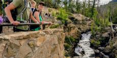 A family of four overlooking Adams Falls