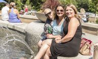 Women Sitting By A Fountain In Cary, NC