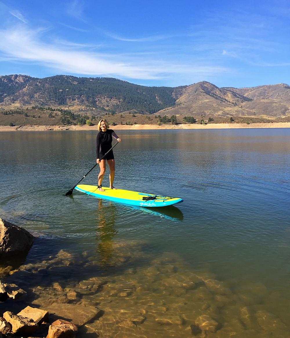 Woman on a Paddle board at Horsetooth Reservoir