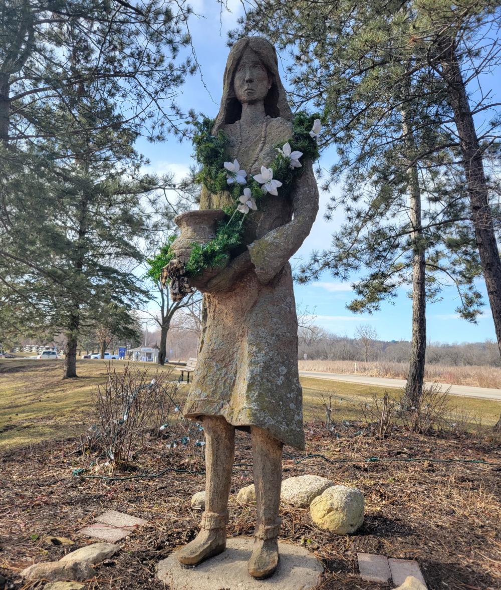 The statue of the Potawatomi women in Williams Bay along the lakeshore.