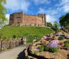 Image shows the approach to Tamworth Castle, on a sunny day