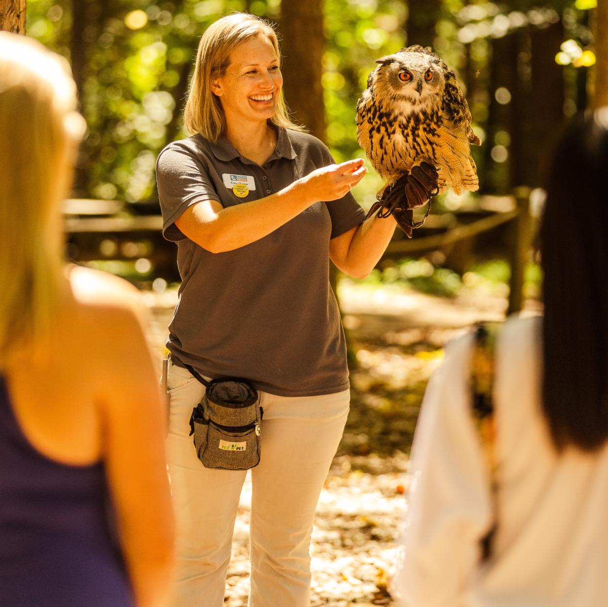 Woman Showing An Owl At Carolina Raptor Center