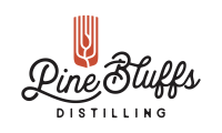 pine bluffs distilling logo