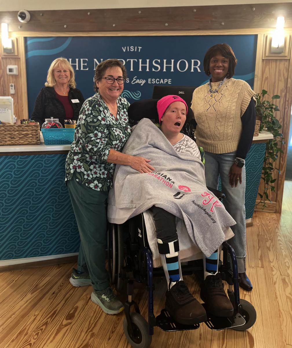 Christy and PJ Paulsell visit the Visit The Northshore Visitor Center with Senior Sales Manager Zondra White Jones and Travel Counselor Sheila Nolinske, whose hospitality helps welcome visitors to St. Tammany Parish.